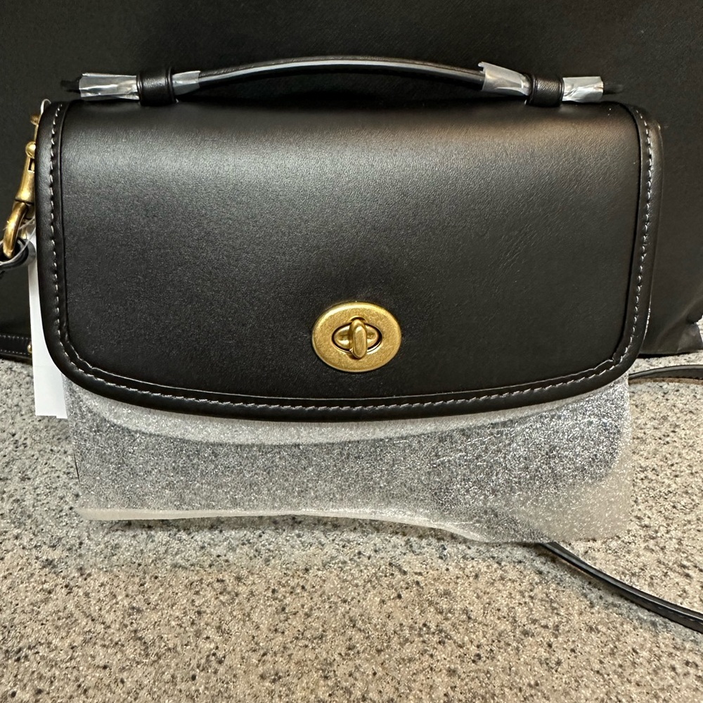 Coach Kip turnlock crossbody